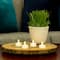 12 Packs: 4 ct. (48 total) Ivory LED Twist Flame Tealight Candles by Ashland®